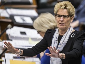 Premier Kathleen Wynne gets questioned on the Liberal ad campaign on hydro rates during question period at Queen's Park in Toronto on March 20, 2017. (Craig Robertson/Toronto Sun)