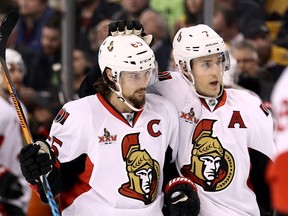 Kyle Turris #7 of the Ottawa Senators celebrates with Erik Karlsson #65 after scoring against the Boston Bruins during the second period at TD Garden on March 21, 2017 in Boston, Massachusetts. (Photo by Maddie Meyer/Getty Images)