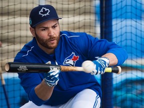 Toronto Blue Jays catcher Russell Martin takes part in batting practice during baseball spring training in Dunedin, Fla., on February 23, 2017. THE CANADIAN PRESS/Nathan Denette