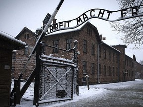 The entrance to the former Nazi concentration camp Auschwitz-Birkenau with the lettering "Arbeit macht frei"  in Oswiecim, Poland is pictured in this Jan. 25, 2015 file photo. (JOEL SAGET/AFP/Getty Images)