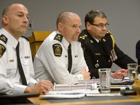 Deputy Chiefs Daryl Longworth, Steve Williams, and London Police Chief John Pare listen to an undercover officer with the London Police human trafficking unit reports to the London Police Services board on Thursday January 19, 2017. MORRIS LAMONT/THE LONDON FREE PRESS /POSTMEDIA NETWORK