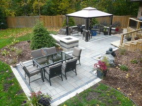 A backyard patio space and deck that has been thoughtfully planned. John DeGroot photo
