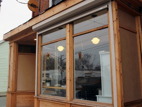The Elm Cafe at 303 Montreal St. has once again become the victim of mischief after its windows were smashed in Kingston, Ont. on Friday March 24, 2017. Steph Crosier/Kingston Whig-Standard/Postmedia Network
