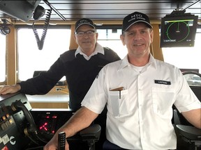 Wolfe Islander III captains Brian Johnson, left, and Joe Gaudreau on Thursday March 23 2017. Kingston native Gaudreau, who became a captain last week, considers Johnson one of his mentors. (Mike Norris/The Whig-Standard