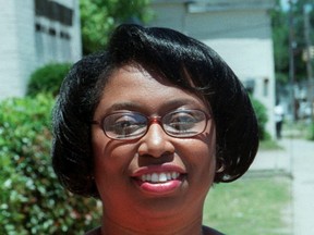 In this photo taken on May 12, 2003, file photo, Cynthia Hurd, a head librarian with the Charleston County Library’s John L. Dart Branch, poses for a picture in Charleston, S.C. (Adam Ferrell/The Post And Courier via AP, File)
