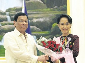 Philippine President Rodrigo Duterte, left, shakes hands with Myanmar?s State Counsellor Aung San Suu Kyi during Duterte?s official visit to Myanmar. In different ways, Duterte and Aung San Suu Kyi symbolize the backsliding on democracy in Southeast Asia. Duterte is a self-proclaimed murderer who boasts about his country?s death squads. (Aung Shine Oo/AP Photo)