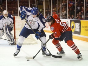 Oshawa Generals' Mason Kohn battled for the puck with Sudbury Wolves' Aiden Jamieson, during Game 1 of the OHL Eastern Conference quarter-final, at the Tribute Communities Centre Friday evening. March 24, 2017 Sabrina Byrnes / Metroland