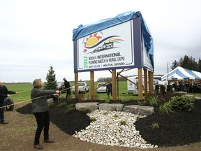 Last year, a small group unveiled the new 100th International Plowing Match & Expo sign in Walton Ont.(Shaun Gregory/Huron Expositor)