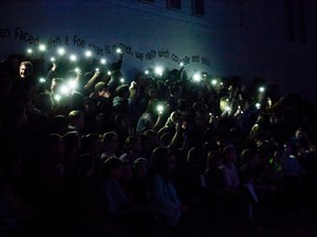 St. Jerome's Catholic School students sway their cell phones to the song Swim performed by Toronto-based band Valley, during a LiveDifferent presentation on Monday, March 20. Taylor Hermiston/Vermilion Standard/Postmedia Network.