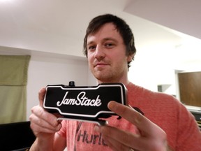 Teacher Chris Prendergast has invented the Jamstack attachable amp for guitars. (MICHAEL PEAKE, Toronto Sun)