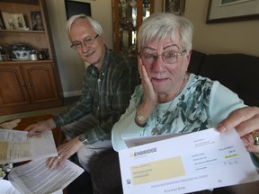 Bill and Muriel Chudiak, are frustrated their gas bill does not spell out their cap-and-trade charge. (STAN BEHAL, Toronto Sun)
