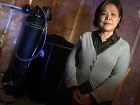 Man Guo had a water softener installed in her house less than two hours after a duo of door-to-door salesmen came to canvas her Kanata home. JULIE OLIVER / POSTMEDIA