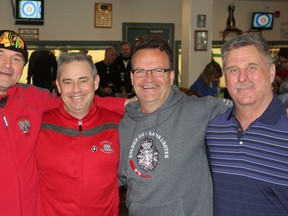 From left, retired Warrant Officer Tom Martineau, a Soldier On participant, Lt.-Col. Patrice Beauchamp, Steve Jeffery and Wayne Williams at the Solder On Rocks bonspiel at Garrison Golf and Curling Club on Saturday. (Steph Crosier/The Whig-Standard)