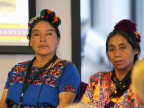 Native Guatemalan midwives Angela Antonieta Perez Vincente, left, and Nazaria Ajanel Xilog attend at Maternal Newborn Child Health knowledge exchange project hosted at Queen's University's Haynes Hall on Saturday. (Steph Crosier/The Whig-Standard)
