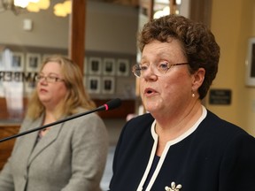 Amy Doyle, associate director of major gifts, left, and Denise Cumming, president and CEO of the University Hospitals Kingston Foundation, speak to Belleville council about the city's contribution to the foundation. (Jason Miller/Postmedia Network)