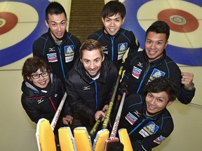 National coach J.D. Lind (centre) has been working with Team Japan, from left, team coach Hatomi Nagaoka, third Tetsuro Shimizu, skip Yusuke Morozumi, second Tsuyoshi Yamaguchi and lead Kosuke Morozumi, for the upcoming Men's World Curling championships in Edmonton. (Ed Kaiser)