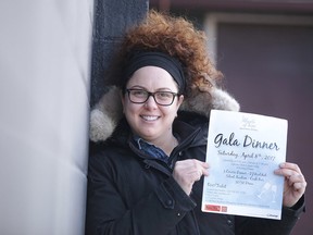 Cristina Scarpellini shows off a poster for the fundraising gala for Angels of Hope Against Human Trafficking on April 8 at the Caruso Club. (Gino Donato/Sudbury Star)