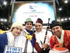 Costumed members of team Ferbey pose during a press conference for the 2007 Ford World Men's Curling Championship in Edmonton on Tuesday, October 31, 2006. From left, Scott Pfeiffer, Dave Nedohin, Randy Ferbey and Marcel Rocque. (File)