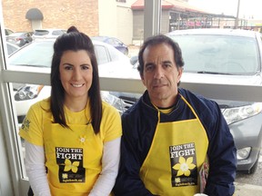 Cancer survivor Dana Crispo and her father Alber volunteee their time to sell daffodils in Sudbury to raise funds for the Canadian Cancer Society. (Photo supplied)