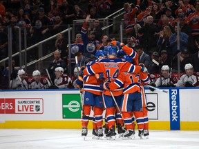 The Edmonton Oilers celebrate Benoit Pouliot's goal against the Colorado Avalanche at Rogers Place in Edmonton on Saturday, March 25, 2017. (David Bloom)
