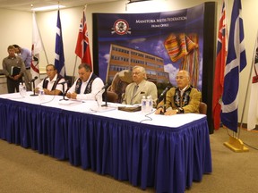 In this July 7, 2010 file photo, (from the left) John Morrisseau, past Manitoba Metis Foundation president, current Manitoba Metis Federation president David Chartrand, Tom Berger, a lawyer, and national president Clem Chartier attend a news conference at the MMF home office in Winnipeg to discuss a land claim. (Postmedia Network files)
