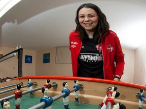 Team Canada foosball player Zoe LaBelle, 24,  poses for a photo in the basement of her Sherwood Park home, Sunday, March 26, 2017. LaBelle is off to Hamburg, Germany to play in the foosball World Cup. Photo by David Bloom