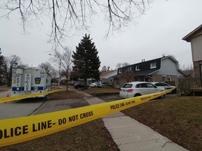 Peel Regional Police at the scene on Tindale Rd., at Sutherland Ave., on Sunday, March 26, 2017 after a woman was found dead in a home. (Pascal Marchand photo)