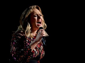 In this Feb. 12, 2017, file photo, Adele performs "Hello" at the 59th annual Grammy Awards in Los Angeles. Adele told a crowd in Auckland, New Zealand, Sunday, March 26, 2017, that her current tour may be her final one. (Photo by Matt Sayles/Invision/AP, File)