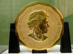 The Dec. 12, 2010 file photo shows the gold coin "Big Maple Leaf" in the Bode Museum in Berlin. The 100-kilogram gold coin disappeared from the museum. (Marcel Mettelsiefen/dpa via AP)