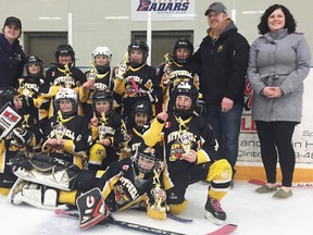 The Mitchell Novice girls HL team won the WOGHL Division 4 championship with a 2-0 series sweep over Huron East. Back row (left): Brooklyn MacLean (trainer), Kayla Visneskie, Haileigh Templeman, Grach Bach, Addy Wolfe, Tegan Mace, Greg Van Bakel (coach), Cathy Templeman (assistant coach). Front row (left): Selina Gethke, Alayna McKay, Macie Russwurm, Maren Marshall and Abigayle Van Bakel. Laying down is Ellie MacArthur. SUBMITTED