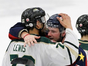 Belleville native Brody Morris of the Wellington Dukes congratulates Cobourg Cougars player Theo Lewis following their second-round OJHL playoff series. Cougars now face the defending league champion Trenton Golden Hawks in the North East Conference final. (OJHL Images)