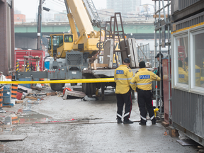 Toronto Police at the scene of an industrial accident at Lower Jarvis and Queens Quay on Monday, March 27, 2017. (Victor Biro photo)