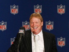 Raiders owner Mark Davis smiles as he steps up to the podium during a news conference after NFL owners approved the move of the team to Las Vegas in a 31-1 vote at the NFL meetings in Phoenix on Monday, March 27, 2017. (Ross D. Franklin/AP Photo)