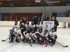 Team- #2 Tyeon Tuff Yellow Horn, #4 Keegan Grant, #7 Carter McGlynn, #9 Hunter McMullen, #10 Maddox Prout, #12 Sasha Shenton, #15 Tristan Grant,#17 Cashe Kropinak, #18 Ava Jessen (missing from photo), #19 Hunter Little Bear, #22 Kaydence North Peigan (goalie), #24 Kayson Crow Shoe, Head coach Dylan Prout, Assistant coach Eric Blanchard, Assistant coach Brad Kropinak, Assistant coach Tyrone Potts, team manager Jessica Jensen | Contributed photo/Jessica Jensen