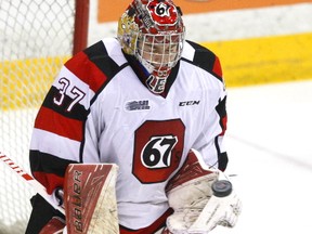 Ottawa 67's goalie Leo Lazarev blocks a shot against the Peterborough Petes during OHL action in Peterborough, Ont., on March 9, 2017. (Clifford Skarstedt/Postmedia Network)