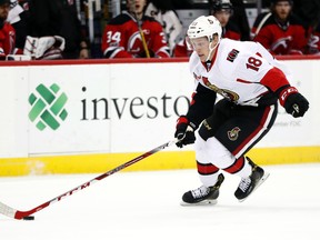 Senators left wing Ryan Dzingel (18) skates with the puck during the first period of an NHL game against the Devils in Newark, N.J., on Feb. 16, 2017. (Julio Cortez/AP Photo)