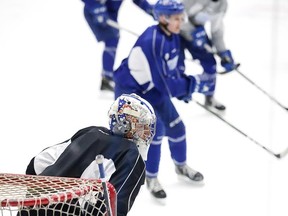 Sudbury Wolves goalie Jake McGrath keeps an eye on the action during team practice  in Sudbury, Ont. on Monday March 27, 2017. The Wolves host the Oshawa Generals on Tuesday for game 3 of the best of 7 playoff series, which is tied at 1 game each.Gino Donato/Sudbury Star/Postmedia Network