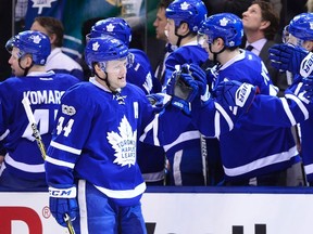 Toronto Maple Leafs defenceman Morgan Rielly (44) celebrates his goal against the Boston Bruins with teammates during first period in Toronto on Monday, March 20, 2017. (THE CANADIAN PRESS/Frank Gunn)