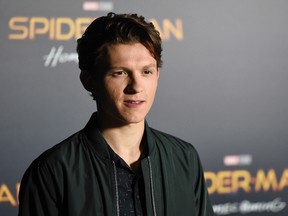 Tom Holland, a cast member in the upcoming film "Spider-man: Homecoming," poses during a photo call backstage of the Sony Pictures Entertainment presentation at CinemaCon 2017 at Caesars Palace on Monday, March 27, 2017, in Las Vegas. (Photo by Chris Pizzello/Invision/AP)