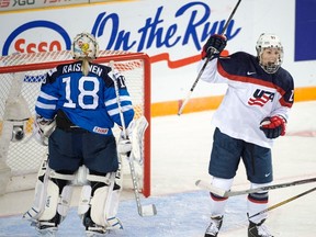 United States' Hilary Knight celebrates after scoring against Finland goaltender Meeri Raisanen during a women's world hockey championships game in Kamloops, B.C. March 29, 2016.