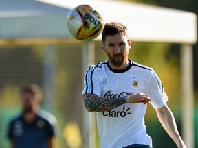 Argentina's forward Lionel Messi kicks the ball during a training session in Ezeiza, Buenos Aires on March 25, 2017. (EITAN ABRAMOVICH/AFP/Getty Images)