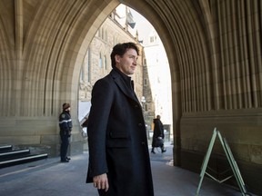 Prime Minister Justin Trudeau leaves Centre Block following a weekend meeting of the national caucus on Parliament Hill in Ottawa on Saturday, March 25, 2017. (THE CANADIAN PRESS/Justin Tang)