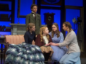Kristy Korevaar, right, shares a moment with, from left, Kezia Haklander Noah Steenbergen, Annika Tauschek and Nicola deVries in the London District Christian school production of Little Women, based on the 1869 semi-autobiographical novel by Louisa May Alcott. (MIKE HENSEN, The London Free Press)