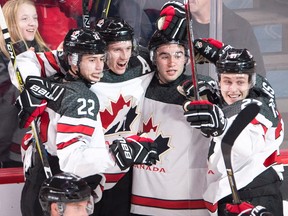 Canada defenceman Thomas Chabot (5) celebrates his goal with teammates Anthony Cirelli (22) Dillon Dube (9) and Mitchell Stephens (27) in the quarter-final of the IIHF World Junior Championships against the Czech republic on Jan. 2, 2017, in Montreal. Dube helped the Kelowna Rockets jump out to a 2-0 lead against the Kamloops Blazers in their first-round WHL playoff series. (The Canadian Press)