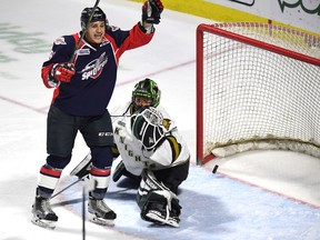 Windsor Spitfires Cristiano DiGiacinto celebrates after the puck scores on London Knights goaltender Tyler Parsons during first period Ontario Hockey League playoff action at the WFCU Centre in Windsor, Ontario on March 28, 2017. The goal was scored by Windsor Spitfires Julius Nattinen. (JASON KRYK/Windsor Star)