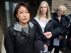 Jin Cha speaks about her brother Alex Cha during a press conference at Participation House in London to draw attention to the need for more assisted living facilities on Friday March 24, 2017. At right is Barbara Belbeck speaking for her son Michael and London MPP Peggy Sattler (MORRIS LAMONT, The London Free Press)