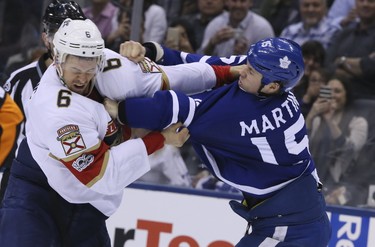 Florida Panthers defenseman Alex Petrovic (6) and Toronto Maple Leafs left wing Matt Martin (15) on Tuesday March 28, 2017. The Toronto Maple Leafs host the Florida Panthers at the Air Canada Centre in Toronto. Veronica Henri/Toronto Sun/Postmedia Network