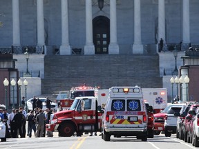 Emergency personnel respond during a lock down after shots were reportedly fired at the U.S. Capitol Visitor Center March 28, 2016 in Washington, DC. A gunman was reportedly captured and a police officer shot at the U.S. Capitol. (Photo by Win McNamee/Getty Images)