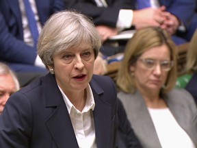 Britain's Prime Minister Theresa May speaks in the House of Commons in London in this image taken from video Wednesday March 29, 2017. May will announce to Parliament that Britain is set to formally file for divorce from the European Union Wednesday, ending a 44-year relationship, enacting the decision made by U.K. voters in a referendum nine months ago and launching both Britain and the bloc into uncharted territory. (Parliamentary Recording Unit via AP)