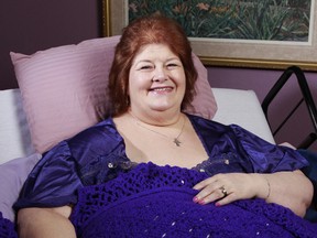 In this July 20, 2012 file photo, Darlene Cates, poses for picture at her home in Forney, Texas. Cates, who played the housebound mother in the 1993 film "What's Eating Gilbert Grape," died at home in her sleep on Sunday morning, March 26, 2017. (Michael Ainsworth/The Dallas Morning News via AP)
